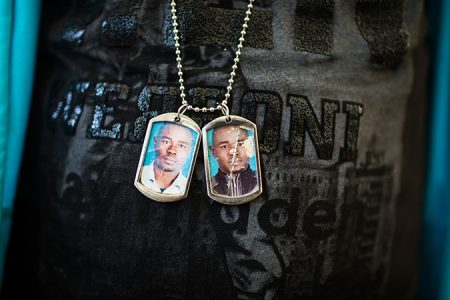 A young men has a chain with two pictures of himself. He says: “This chain is very important to me, If something is happening to me I can be identified.” 
Sankt Pauli Kirche, Lampedusa in Hamburg